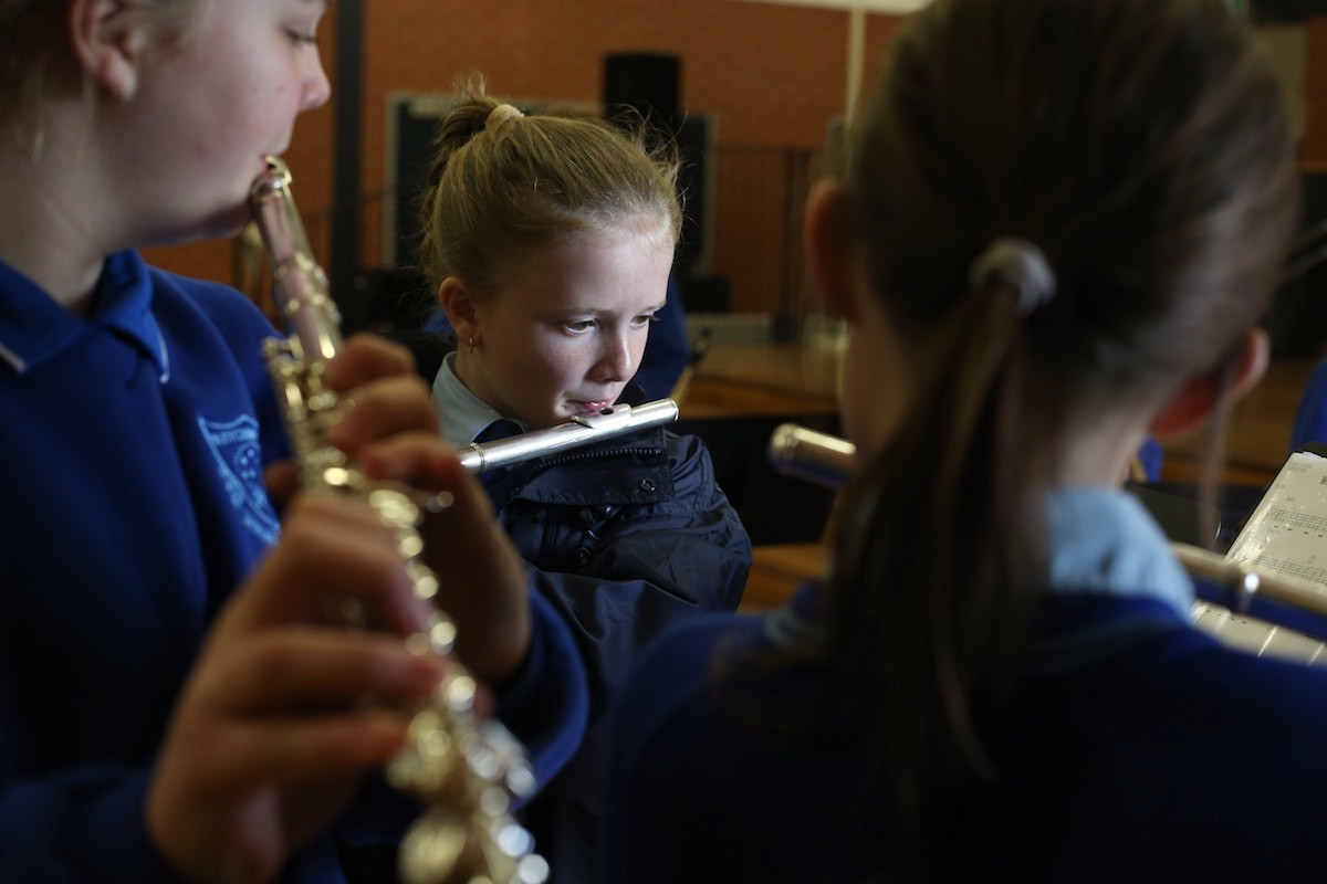 Students doing music practice